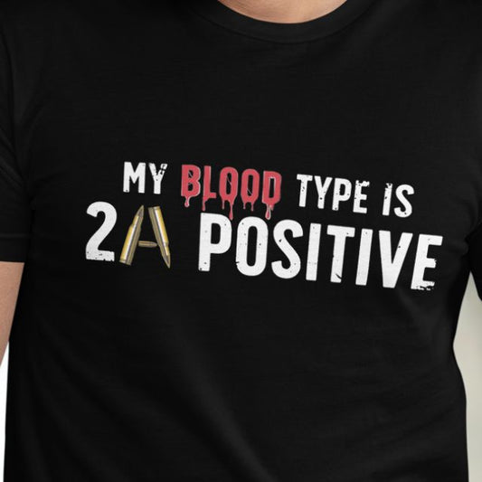 Close-up of My Blood Type is 2A Positive slogan with bullet graphic on men’s Second Amendment t-shirt.