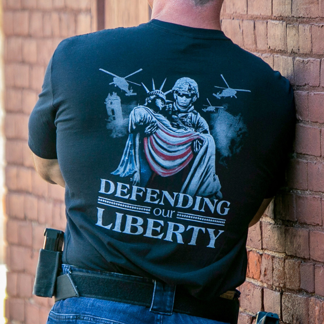 Close-up of soldier and Lady Liberty graphic on Defending Our Liberty men’s shirt