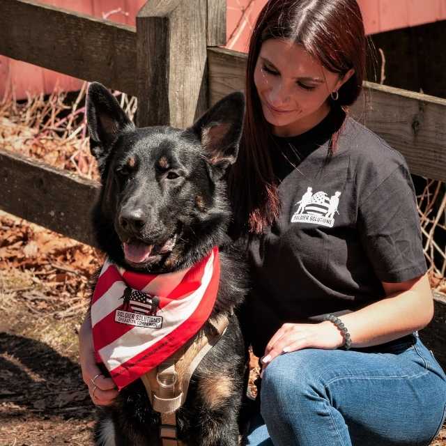Soldier Solutions front logo on Home Security women’s dog-themed patriotic tee