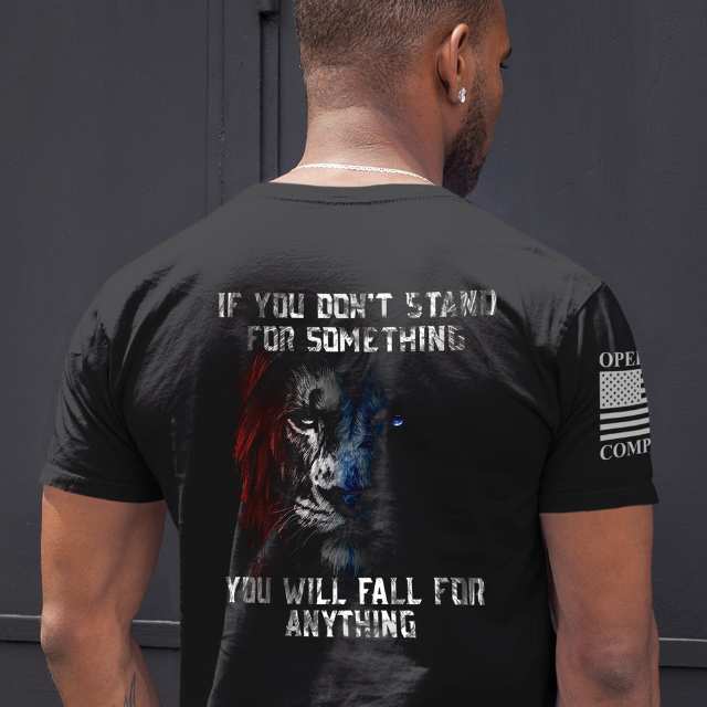 Man wearing Stand for Something t-shirt showing lion and motivational quote on back