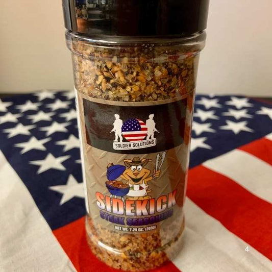 Soldier Solutions Sidekick Steak Seasoning bottle displayed on American flag background with bold branding