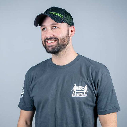 front view of men’s Soldier Solutions tee with chest logo and tactical sleeve patch