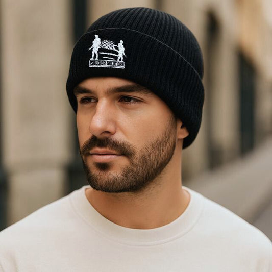 Man wearing Soldier Solutions black knit tactical beanie with embroidered logo