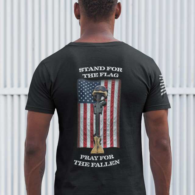 Back view of men's Stand for the Flag Pray for the Fallen t-shirt with battlefield cross and American flag graphic
