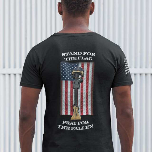 Back view of men's Stand for the Flag Pray for the Fallen t-shirt with battlefield cross and American flag graphic