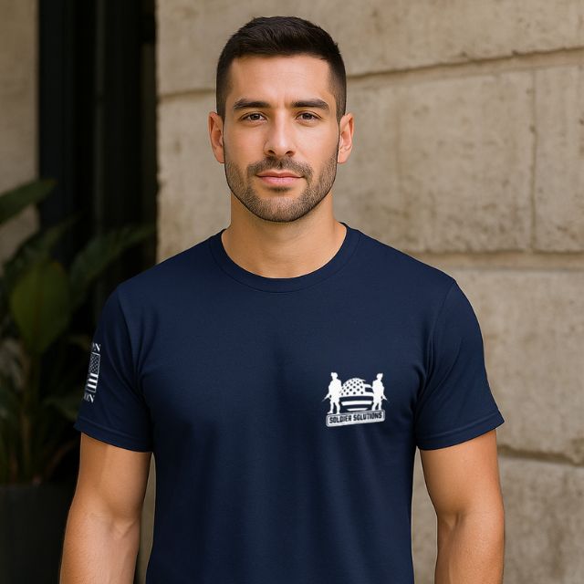 Front view of We Breathe Freedom men’s t-shirt with Soldier Solutions logo on chest