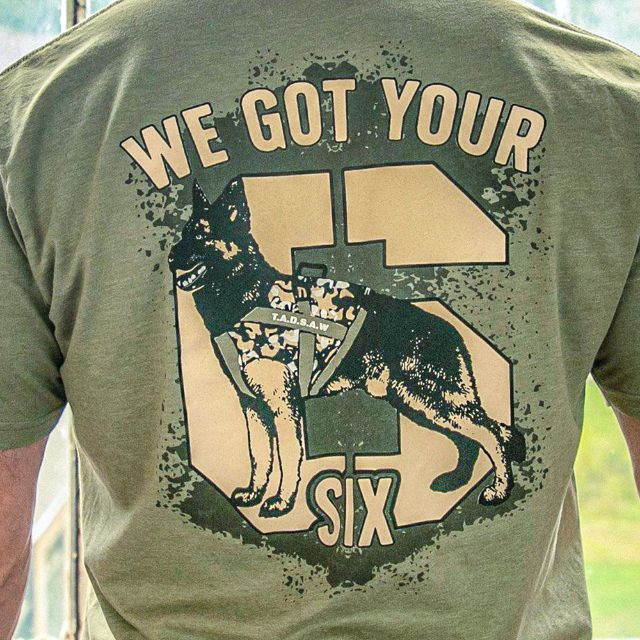 Close-up of We Got Your Six graphic with German Shepherd wearing TADSAW vest