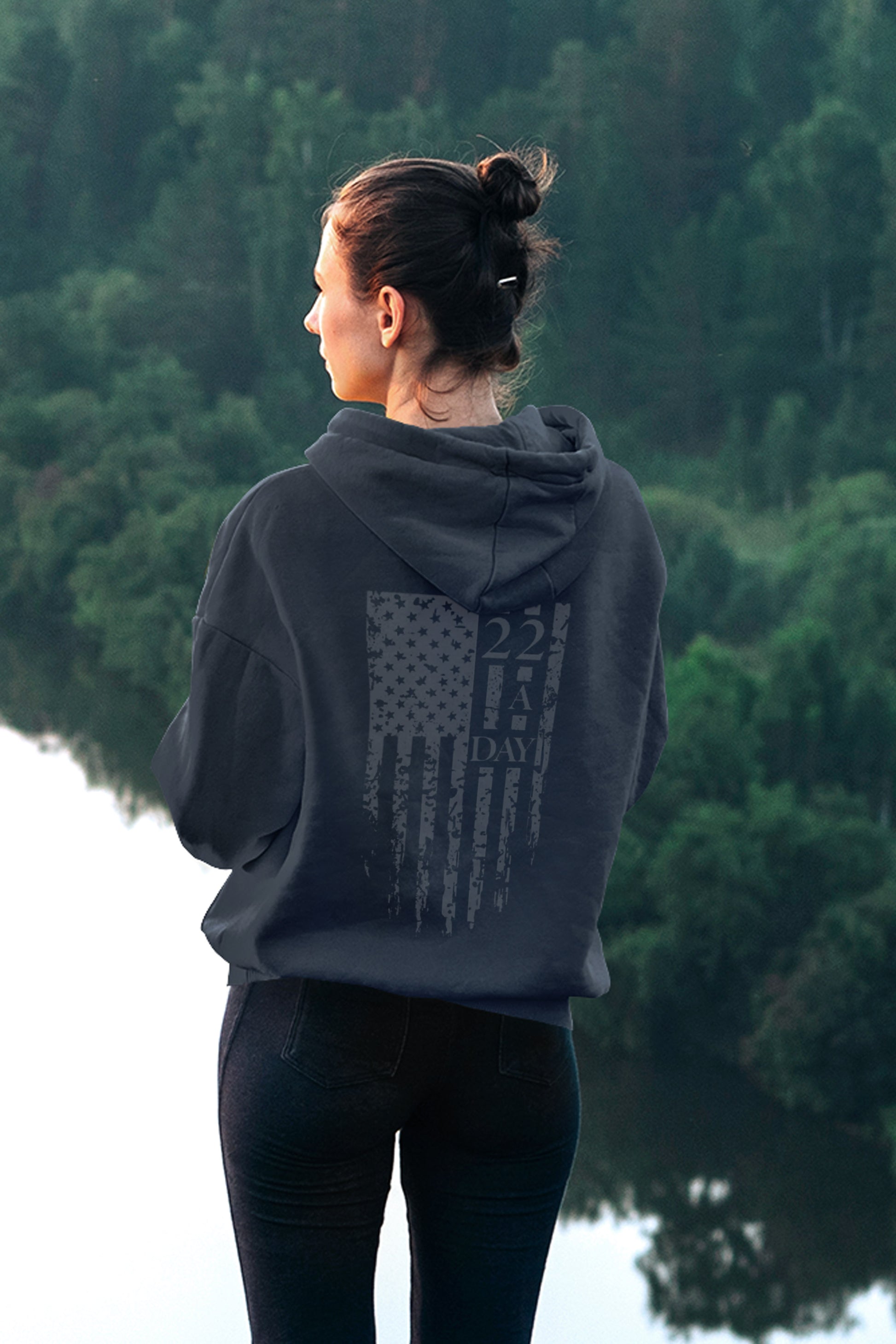 Back of women’s 22 A Day patriotic hoodie featuring distressed American flag and veteran suicide awareness message.