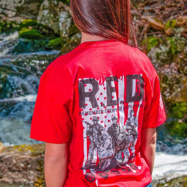 Back of R.E.D. shirt with Remember Everyone Deployed text and soldier graphic