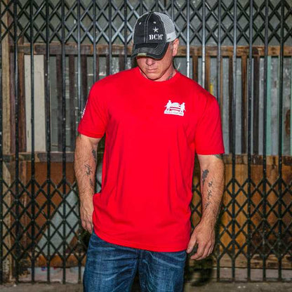 Man wearing R.E.D. shirt with Soldier Solutions logo on chest and Operation Companion patch on sleeve