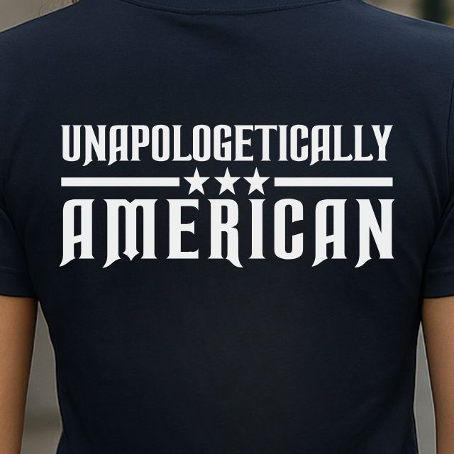 Close-up of Unapologetically American text graphic on patriotic shirt