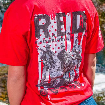Close-up of Women's Remember Everyone Deployed soldier graphic and American flag print