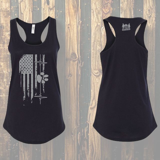 American Companion women’s patriotic racerback tank top with front flag, heart line, paw print graphic, and back Soldier Solutions logo.