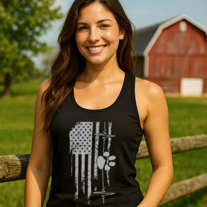 Women’s patriotic racerback tank featuring distressed American flag, heart line, and paw print graphic.
