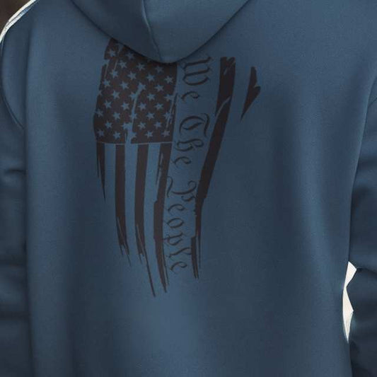 Close-up of back print with distressed American flag and “We The People” text on hoodie