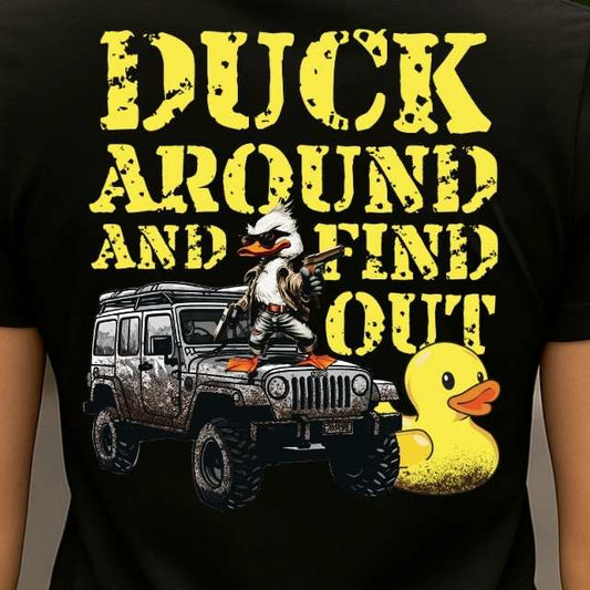 Close-up of tactical duck standing on Jeep with “Duck Around and Find Out” text on women’s t-shirt