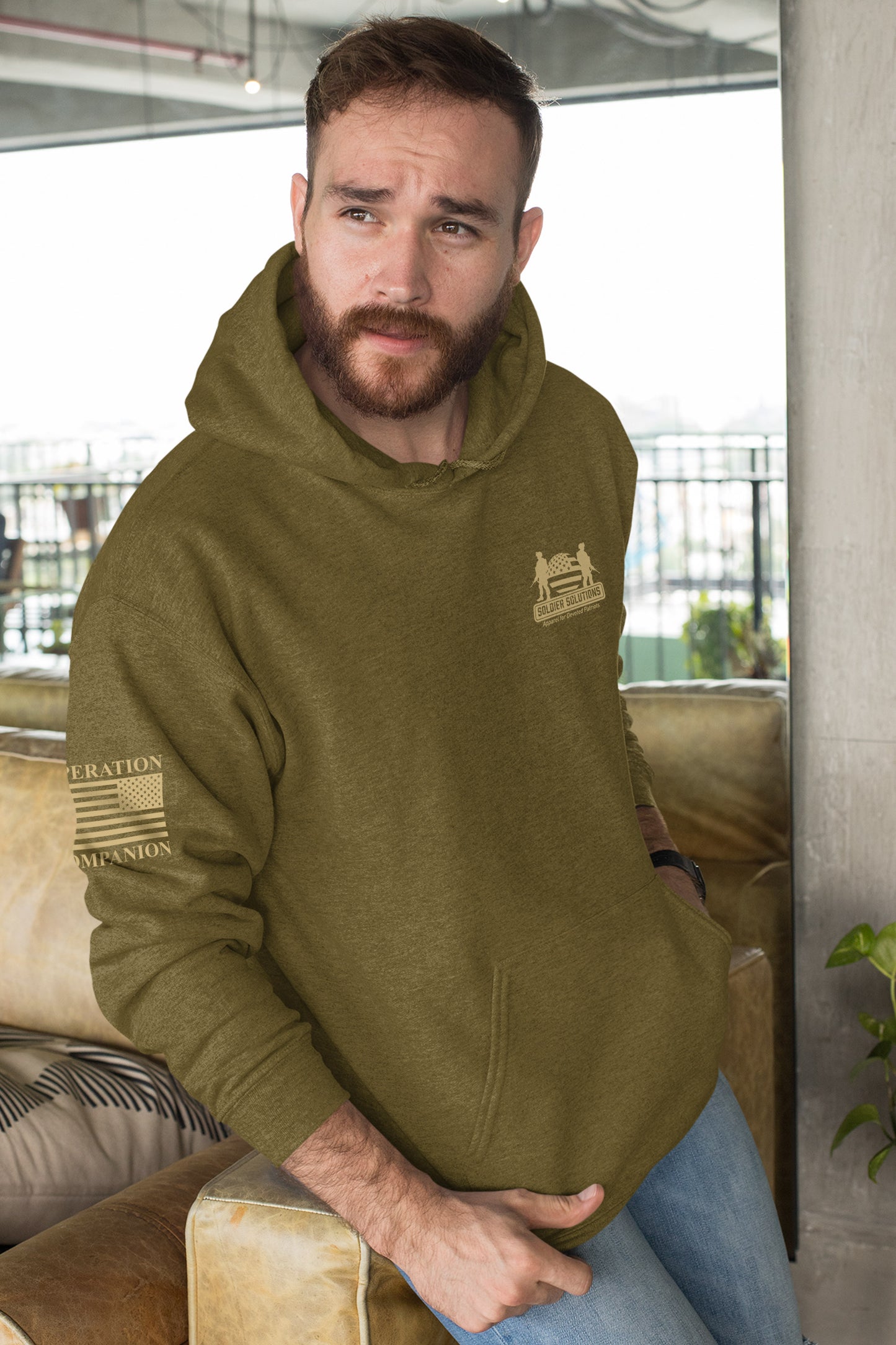 IGY6 men’s hoodie with Soldier Solutions chest logo and tactical sleeve flag print.
