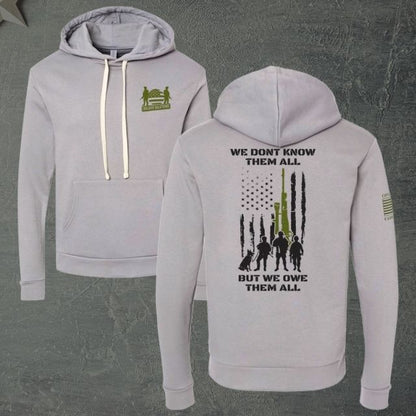 Front and back view of grey hoodie honoring veterans with tribute design