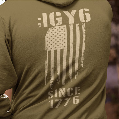 Back of IGY6 men’s hoodie with vertical distressed American flag and Since 1776 print with sleeve detail.
