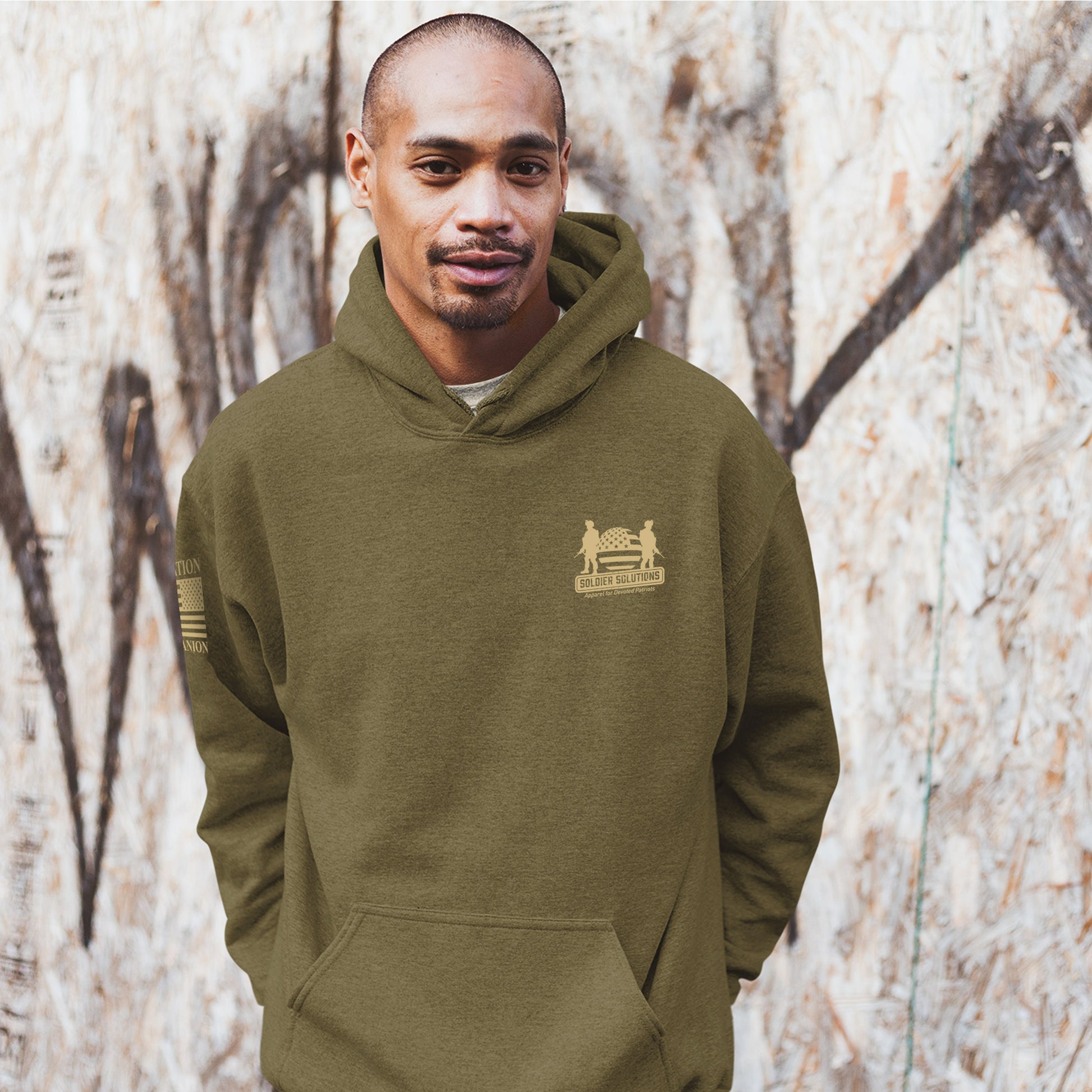 Front of IGY6 men’s hoodie showing Soldier Solutions logo and American flag sleeve print.