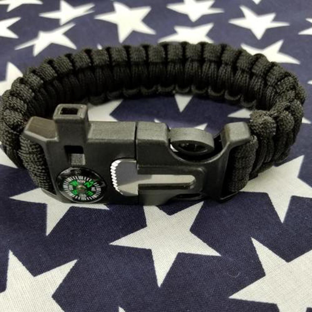550 paracord bracelet with built-in compass, whistle, and durable survival cord.