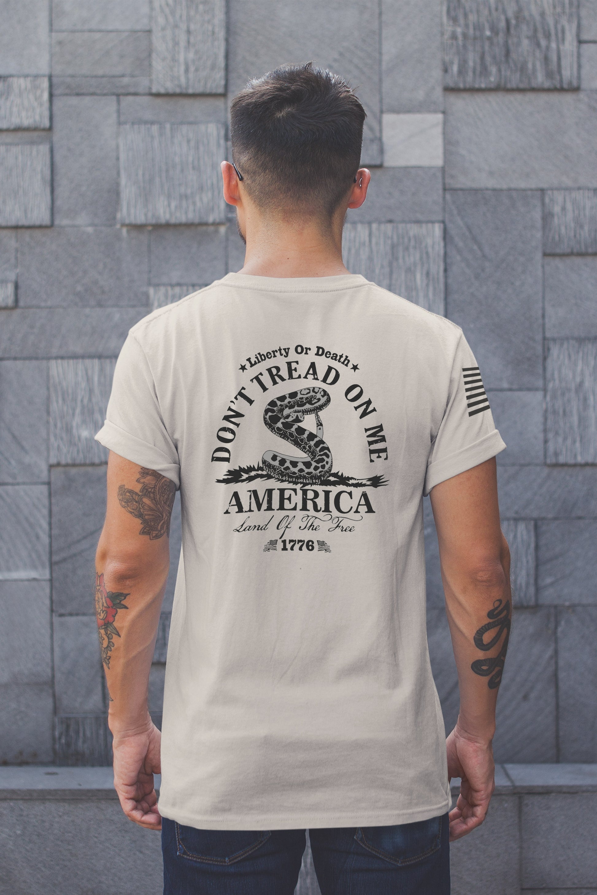 Back of Don’t Tread on Me shirt with Gadsden flag rattlesnake, Liberty or Death message, and 1776 founding date.