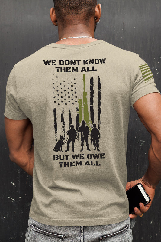 Men’s patriotic memorial t-shirt with American flag, rifle silhouette, and quote honoring fallen heroes.